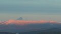 Snowy Mt. Mansfield in the glow of the setting sun.