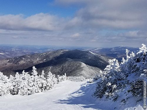 Photo of snowy mountains from atop Sugarbush, Vermont