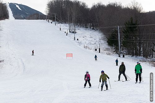 Skiing deals at Pico, Vermont Photo of families at base of Pico ski area in Vermont