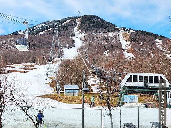 View of partially snowy Tram Side of Jay Peak Resort