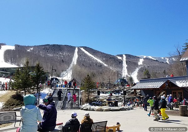 Photo of base area of Sugarbush Resort with ski runs in the background