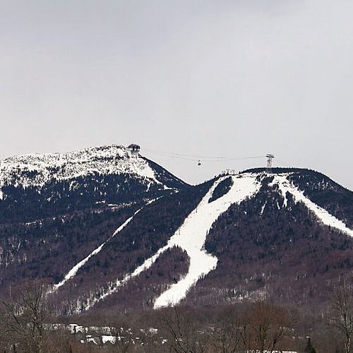 Photo of Jay Peak Resort from a distance showing the tram