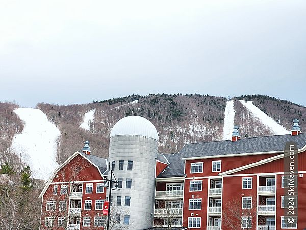 Sugarbush base condos with ski trails behind them