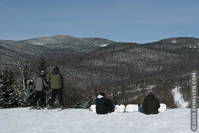 College-aged skiers and riders take to the mountains of northern Vermont.