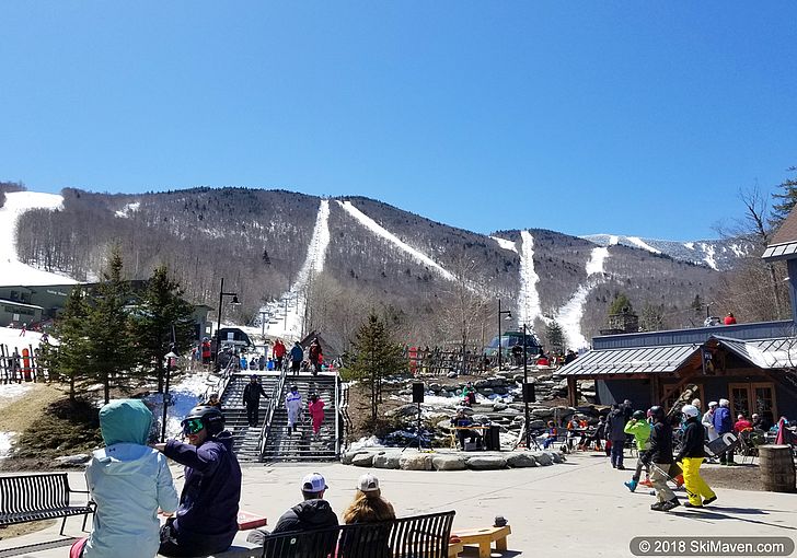Photo of base area of Sugarbush Resort with ski runs in the background