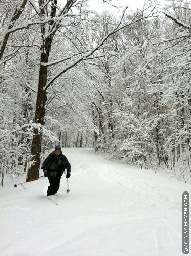 Telemark turns on the snowy CCC road. Telemark turns on the snowy CCC road.